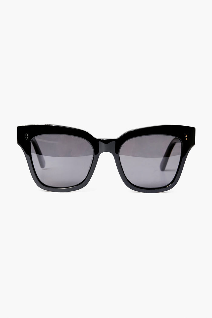 Chimi black rectangular sunglasses with thick acetate frames and dark tinted lenses provide stylish UV protection.