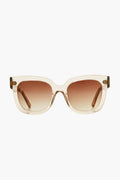 Chimi oversized square sunglasses made from Italian acetate, featuring transparent beige frames and brown gradient lenses that provide 100% UV protection.
