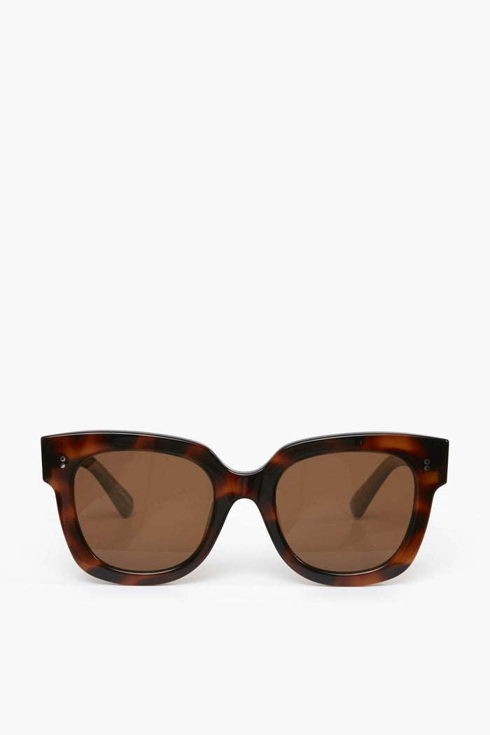 Chimi brown tortoiseshell rectangular sunglasses crafted from acetate, featuring dark lenses and reliable UV protection.