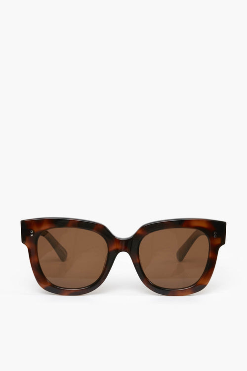 Chimi brown tortoiseshell rectangular sunglasses crafted from acetate, featuring dark lenses and reliable UV protection.