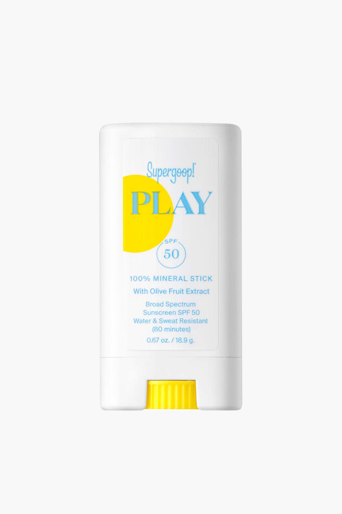 A white Supergoop! Play SPF 50 mineral sunscreen stick offers 100% mineral, reef-friendly broad spectrum protection with olive fruit extract, plus water and sweat resistance.