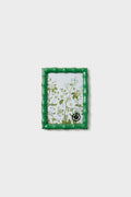 The Two's Company small rectangular chinoiserie photo frame features a green bamboo-style border showcasing a botanical illustration—an ideal accent to add charm to your home decor.