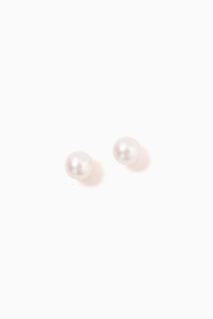 Tuckernuck Jewelry's round white freshwater pearl stud earrings are beautifully crafted and hypoallergenic, perfect for sensitive ears.