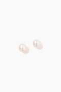 Tuckernuck Jewelry's round white freshwater pearl stud earrings are beautifully crafted and hypoallergenic, perfect for sensitive ears.