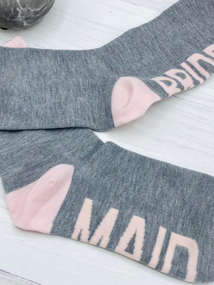 Our Hen Party Fun Socks are an added addition to any hen party. These bride squad cotton socks are a ladies one size (4-8) with a luxurious feel and extremely soft to the touch. Available in the colours shown only. So, why settle for plain socks when you can elevate your wedding party look with our Bridesmaid and Bride…