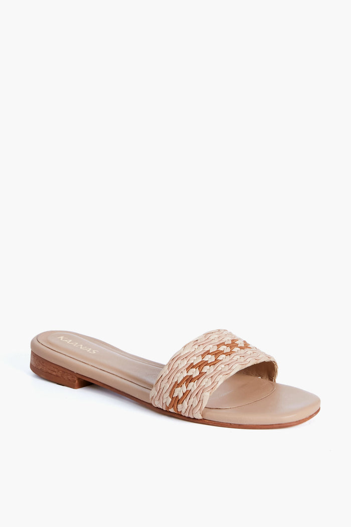 The Kaanas Almond Taboga Sandal features a beige woven strap, open toe, and low heel—ideal for anyone looking for stylish boho slides.