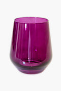 The Estelle Colored Glass tumbler, made from hand-blown transparent purple glass, radiates the refined elegance of luxury glassware.