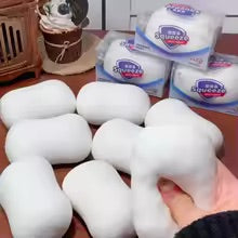 Multiple white ASMR crunchy soap ball squishy stress balls displayed together