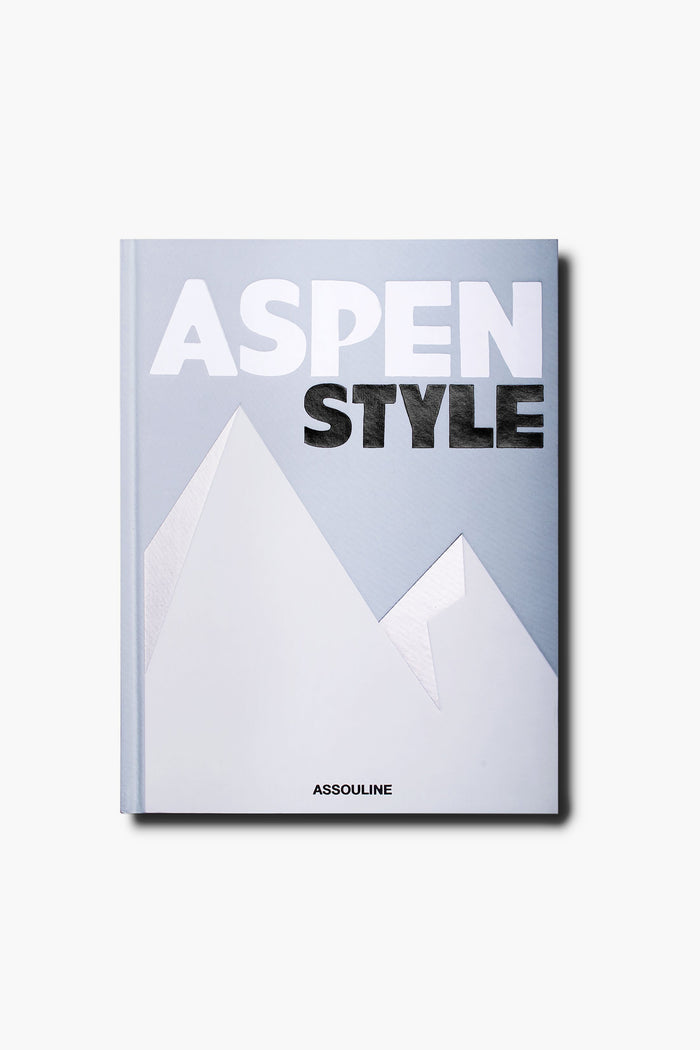 Aspen Style by Assouline features a minimalist mountain design on a light gray cover, capturing Aspen's glamour and history, with the Assouline brand at the bottom.