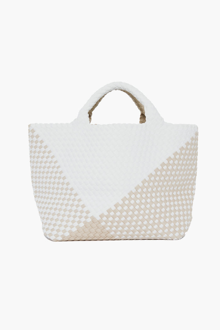 The Naghedi woven tote bag features two short handles and a chic white and beige checkered pattern, perfect for elevating your style.