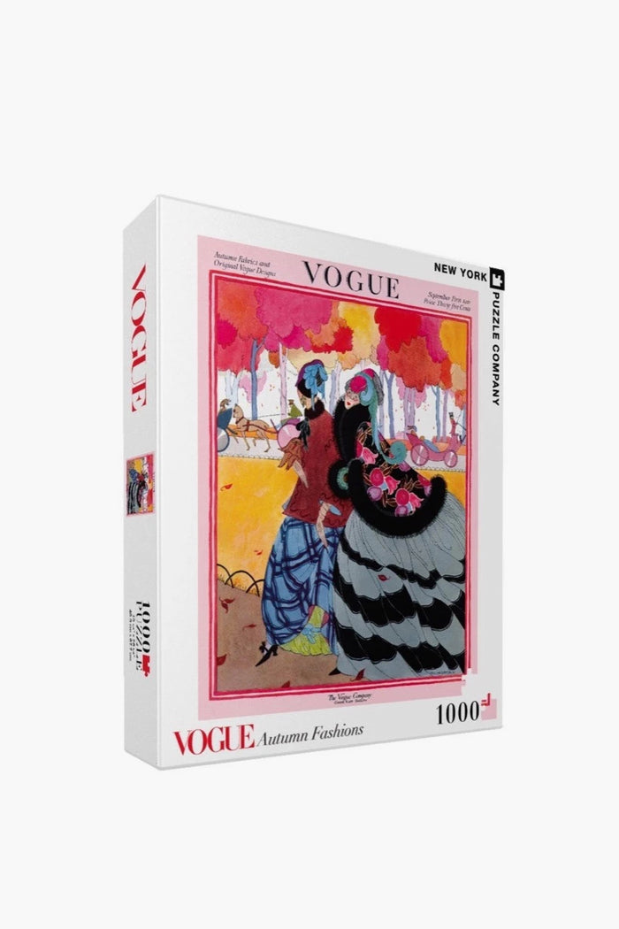 The New York Puzzle Company offers a 1000-piece puzzle box with a vibrant illustration of two women in autumn fashion, inspired by a vintage Vogue Cover and Helen Dryden's iconic style.
