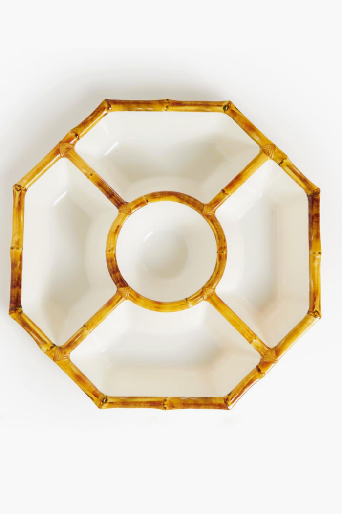 Two's Company presents an octagonal melamine serveware tray with a bamboo rim, featuring six compartments around a central chip and dip bowl—ideal for stylish entertaining.