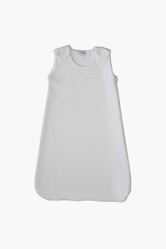 Nella Pima’s white sleeveless Quilted Baby Sack is crafted from soft Peruvian Pima cotton with textured fabric and shoulder snap closures.
