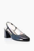 A navy blue color-blocked slingback pump by French Sole featuring a block heel and a black patent leather toe cap.