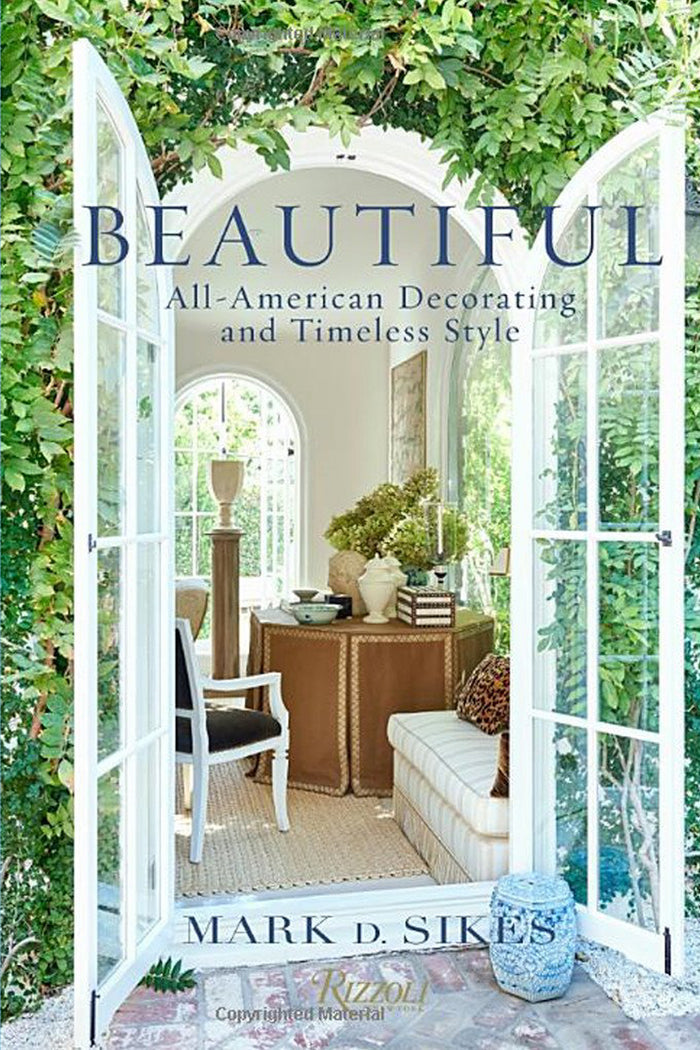 Book cover of Beautiful: All-American Decorating and Timeless Style by Mark D. Sikes from Rizzoli, featuring open French doors that welcome California indoor/outdoor living into a vibrant space with lush greenery above.