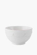White ceramic bowl by Juliska, showcasing the signature Berry & Thread raised rope and dot design along the upper rim.