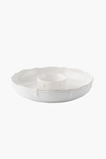 The Juliska white ceramic stoneware serving platter features a scalloped edge and central bowl inspired by the Berry & Thread design—ideal as a chip n dip bowl for serving dips or sauces.