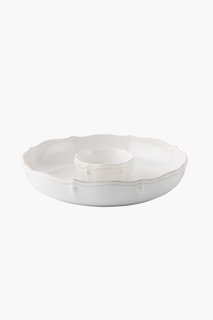The Juliska white ceramic stoneware serving platter features a scalloped edge and central bowl inspired by the Berry & Thread design—ideal as a chip n dip bowl for serving dips or sauces.