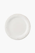 A round, plain white ceramic stoneware dinner plate by Juliska featuring Berry & Thread's raised dotted and rope-like border design, viewed from above.