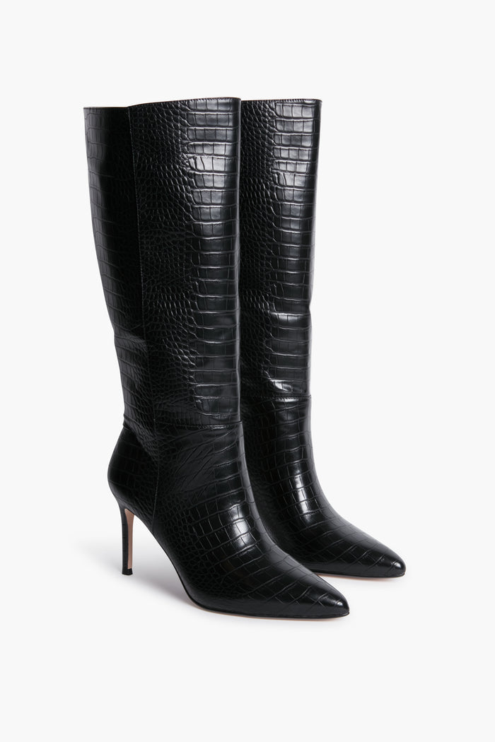 A pair of Black Matisse Alina Boots, knee-high with a crocodile-embossed pattern, pointed toes, and high stiletto heels.