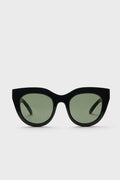 A pair of Le Specs cat eye sunglasses in black with dark tinted lenses is displayed.