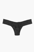 The Hanky Panky black lace low-rise thong features a floral pattern, wide stretch lace waistband, and minimal coverage, making it an elegant addition to women's lingerie.