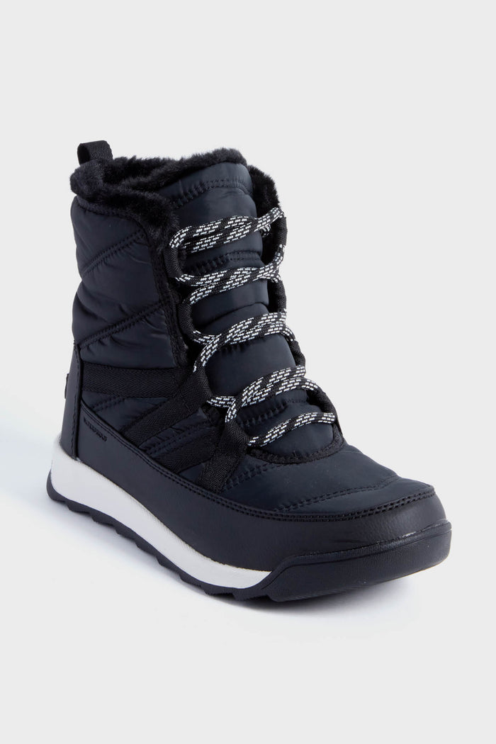 The Sorel waterproof black winter boot features white and black patterned laces, a faux fur lining, and a thick white and black sole.