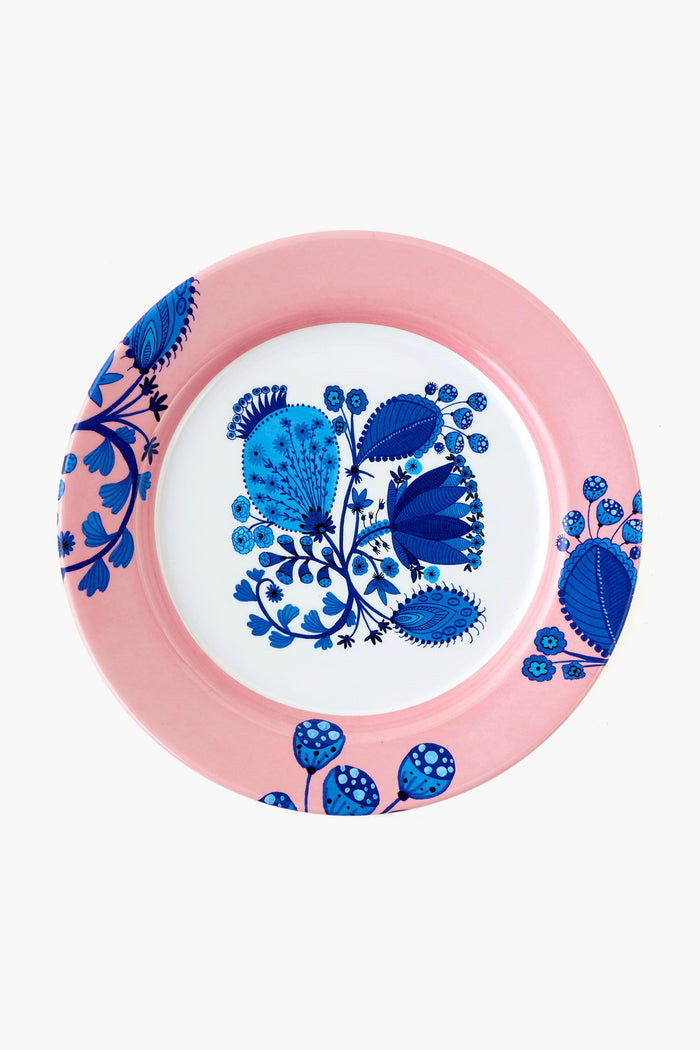 A round blue and white tableware plate by One Hundred 80 Degrees, featuring a pink rim with blue floral designs on the rim and center; dishwasher safe.