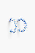 Nicola Bathie Blue Bead Hoop Earrings feature round beads painted with delicate blue flowers, offering a chinoiserie-inspired jewelry style.