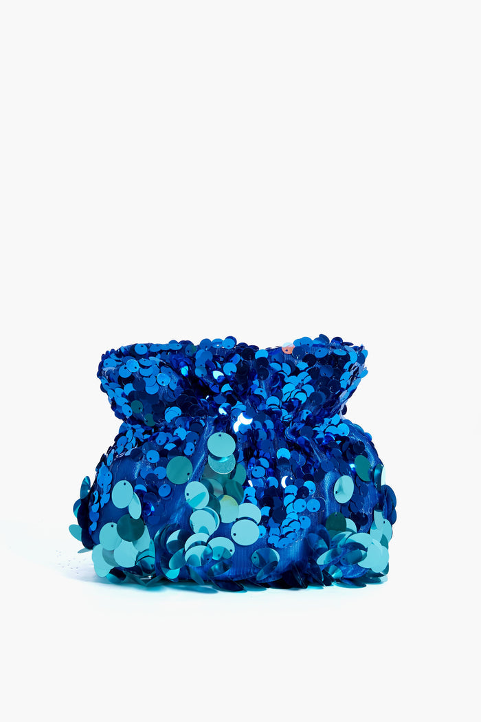 The Olga Berg small blue drawstring pouch features shiny blue and turquoise sequins—ideal as a clutch for special occasions or an evening bag.