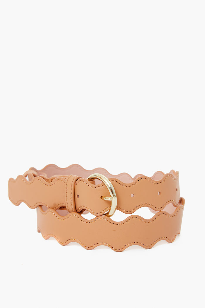 Loeffler Randall Tan Blythe Ric Rac Belt crafted from scalloped nappa leather with a gold circular buckle, elegantly coiled and ready to wear.