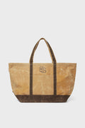 Large tan and brown canvas bag by CB Station with two handles and ES logo on the front, perfect as a personalized tote for everyday use.