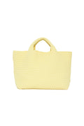 A yellow woven tote bag with two handles by Naghedi, inspired by their signature style and the popular St Barths Medium Tote.