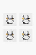 Set of four white August Morgan cocktail napkins, each with an embroidered bee above the word “Buzzed!” in black script—ideal for entertaining guests.