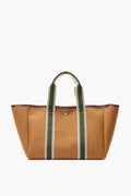 A brown canvas Rue de Verneuil tote bag featuring olive green and white striped handles for a touch of luxury.