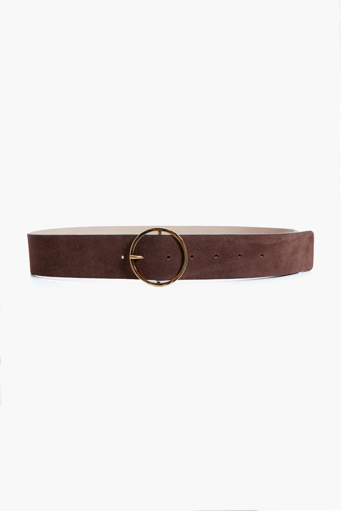 The B-Low the Belt brown chocolate Molly belt features suede, a wide strap, and a striking gold circle buckle—perfect as a leather hip belt to elevate your outfit.