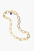 Jane Win gold chunky chain bracelet featuring oval links, a lapis bead accent, and a round gold tag.