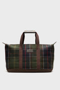 A Barbour rectangular tartan duffel bag with two brown handles, a leather front patch, and a zippered top. Features green, red, and yellow stripes.