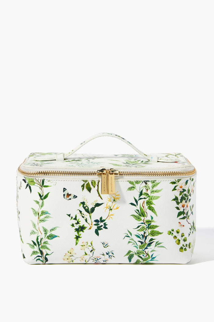 Neely & Chloe x Inslee rectangular vanity case in white saffiano leather with a gold zipper, top handle, and a green botanical floral pattern—an ideal holiday gift.