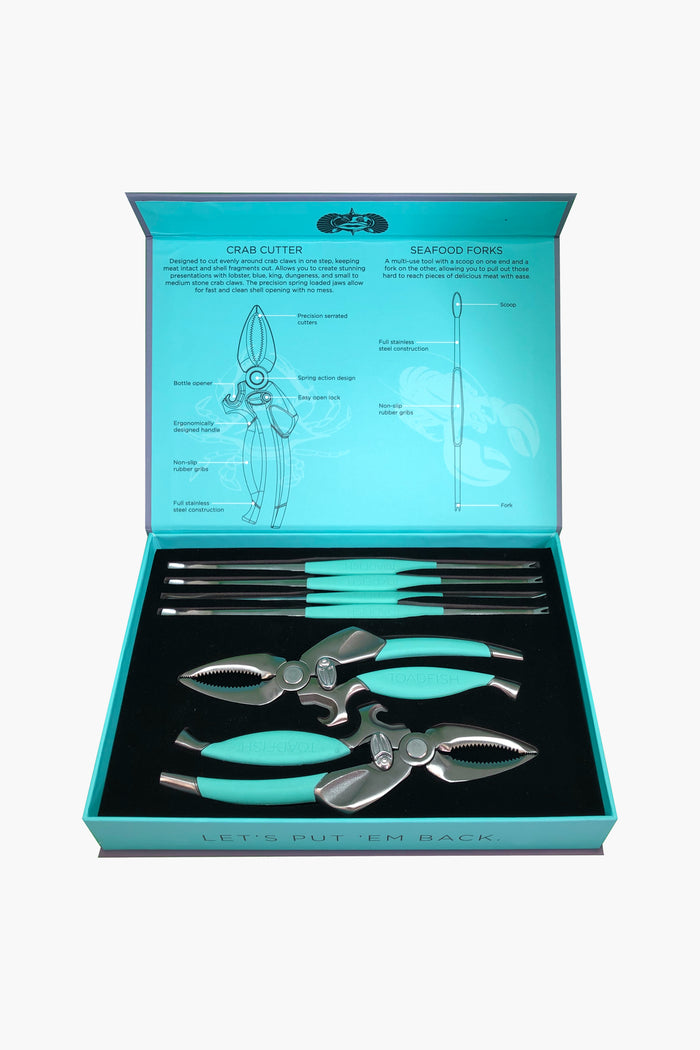 The Toadfish boxed seafood tool set includes two crab cutters and four turquoise-handled seafood forks, plus diagrams and instructions—perfect eco-friendly coastal tools for enjoying your favorite crab and lobster dishes.