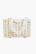 BTB rectangular white wicker bag with boho-chic style, flap closure, and a chunky white chain strap.