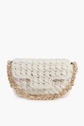 The Caterina Bertini small white crochet bag features a flap closure and gold chain strap, making it a chic woven shoulder bag for any occasion.