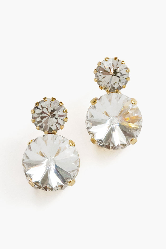 A pair of Jennifer Behr gold-plated earrings with two round clear gemstones—smaller above, larger below—ideal for adding a touch of luxury to your accessories collection.