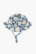 The Angel Dear blue bucket hat features a white and yellow daisy pattern, wide brim, and adjustable chin strap. This adorable floral print sunhat is perfect for babies to wear on sunny days.