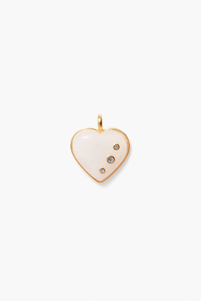 The Tuckernuck Jewelry gold-edged white heart pendant features three gemstones, including a Blue Topaz Birthstone Charm, and a loop for attaching to a chain—perfect as a charm necklace or December birthday gift.