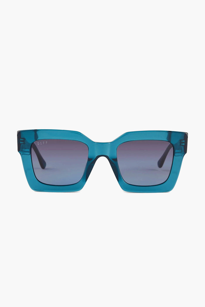 Oversized square sunglasses from DIFF Eyewear featuring a rectangular blue gradient design, thick frames, and dark tinted lenses.