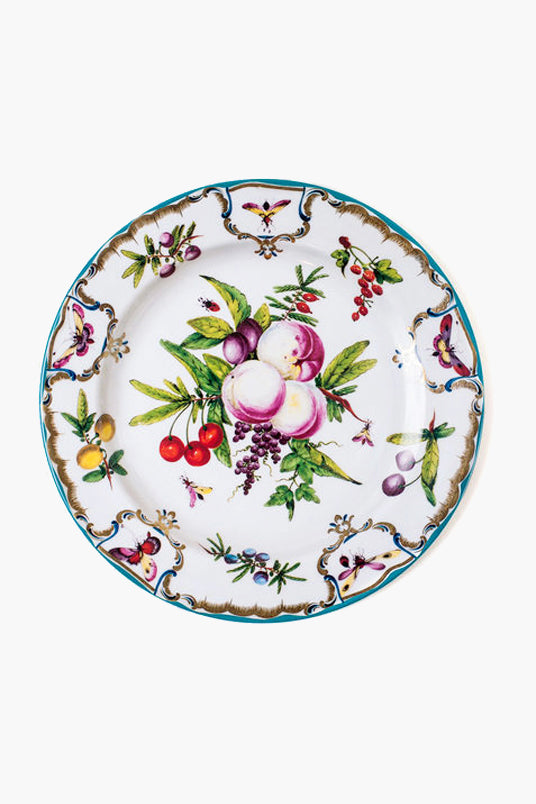 Decorative plate by One Hundred 80 Degrees, inspired by Duke of Gloucester Tin Plate, features vibrant fruit illustrations and ornate floral rim. Crafted for easy cleaning, perfect as stylish tableware.