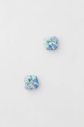 Mignonne Gavigan’s small blue and white checkered fabric flower pins with beaded centers create charming floral earrings, perfect for adding a stylish touch of beaded jewelry.