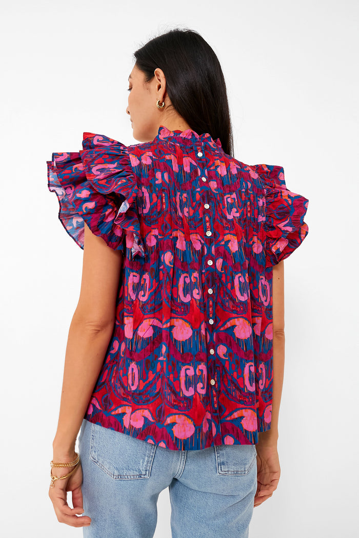 Exclusive Blue Kazak Pintuck Ruffle Top with flutter sleeves and button-down back, showcasing a classic, effortless, and fun design for a high-end, versatile look.