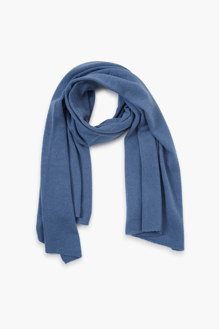 An elegant light blue cashmere scarf by Amicale, perfect for sophisticated styling.